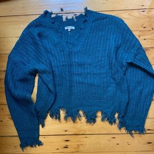 Distressed sweater